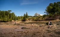 Photograph of the Fundy Discovery Aquarium, seen from the sea.