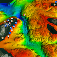 Rainbow coloured digital render of seabed created from multibeam sonar data with point of interest markers.